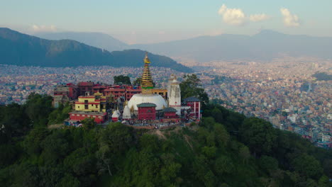 Orbiting-Swayambhunath-Stupa,-Kathmandu-at-golden-hour