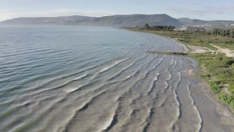 coastal view of a lake with gentle waves