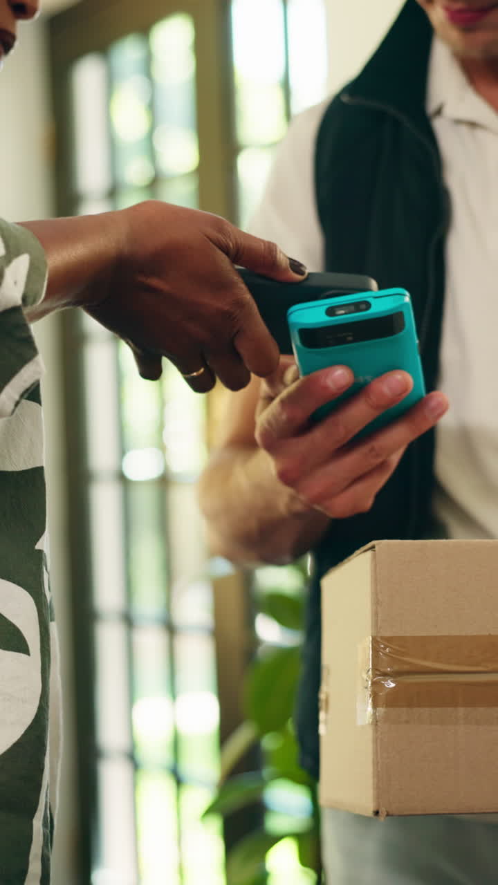 Customer Scans Delivery Driver's Device with Smartphone for Package