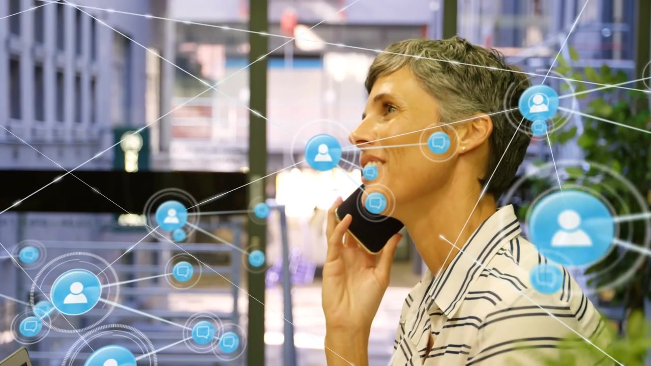Animation of network of connections with icons over caucasian woman using smartphone