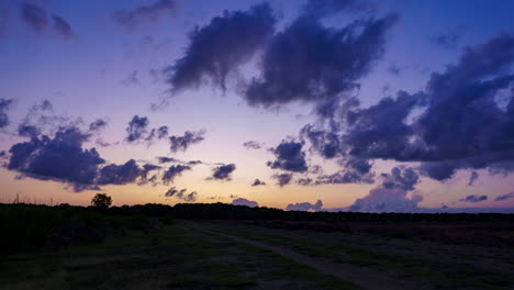 clouds at sunset, moving slowly over the heath after a long, warm summer day