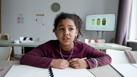 girl studying in a classroom