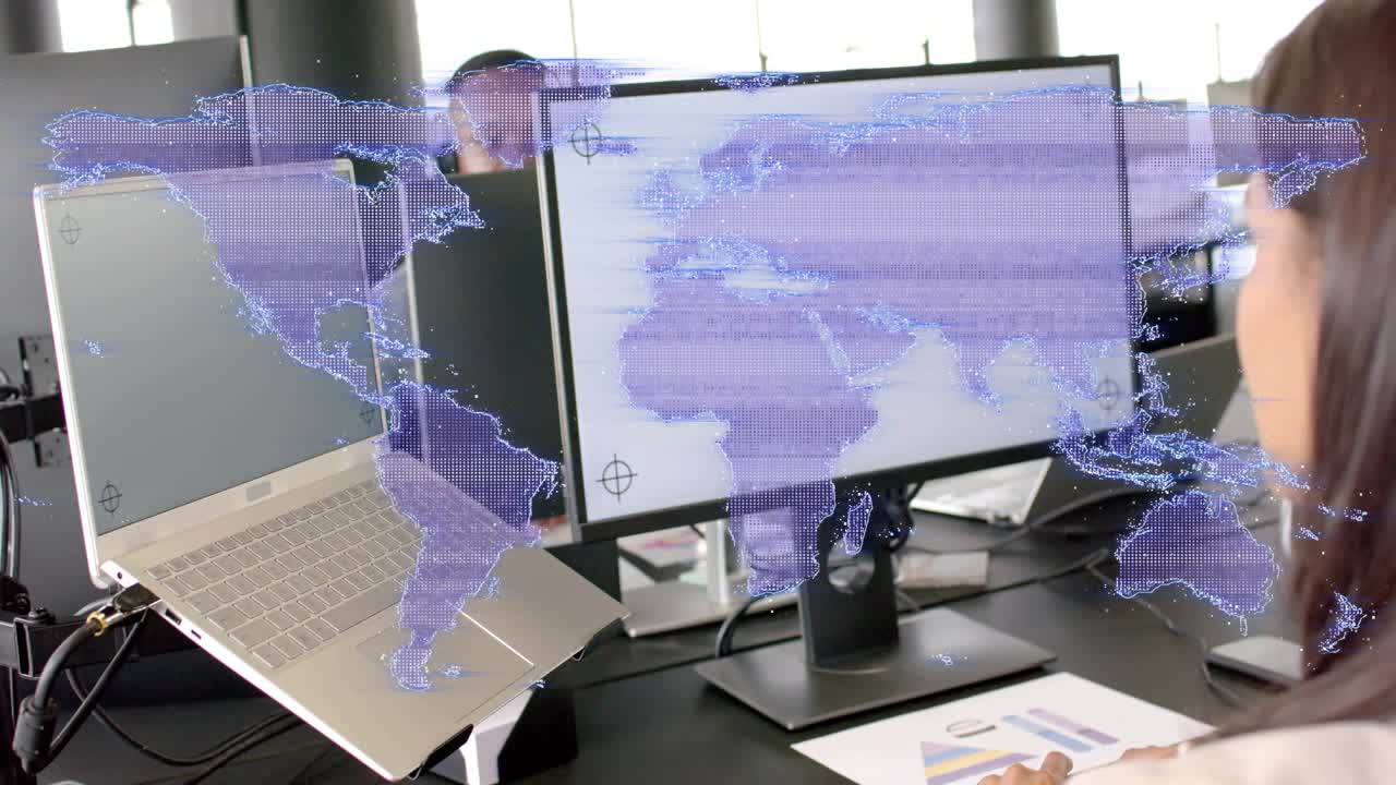Coworkers shifting focus on monitor and chart, map overlay appearing, man rising, business analysis