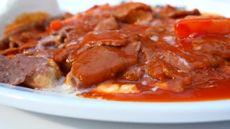 Seekh-kabab-with-tomato-sauce-on-a-plate-,