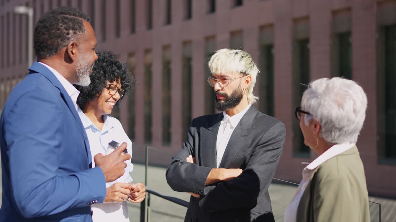 Business people talking relaxed outdoors in financial district