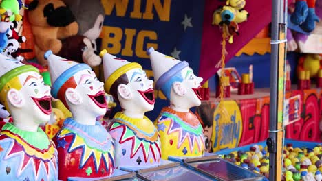 colorful clown prize game at a fun fair