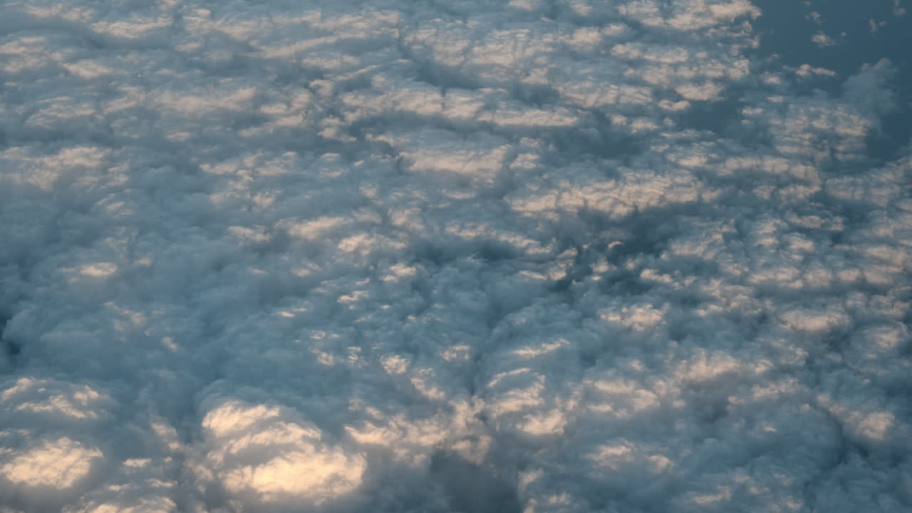 Airplane flight above the clouds
