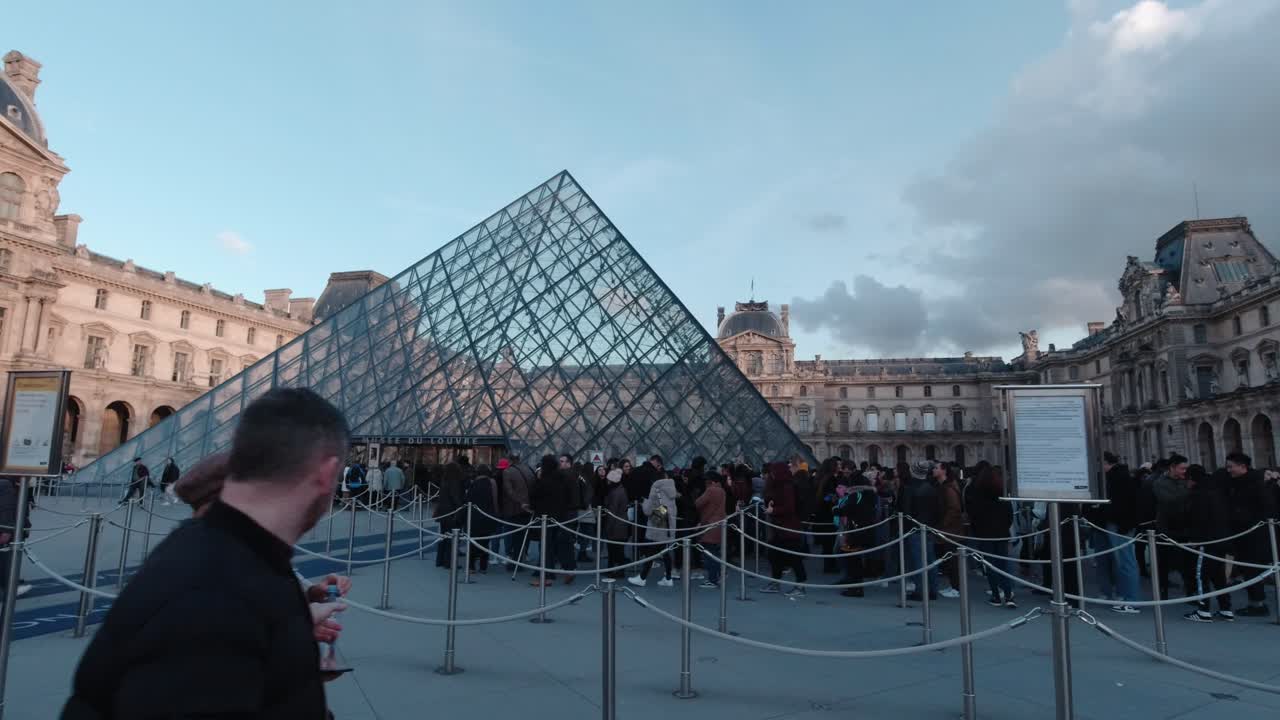 Shot of people queuing out of the museum