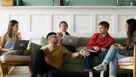 Study-Group-Sitting-On-Sofa-And-Floor-3