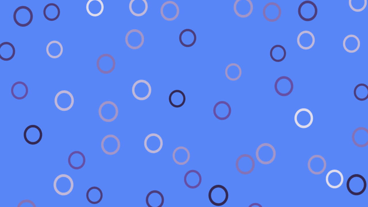 Digital animation of multiple grey circular shapes against blue background