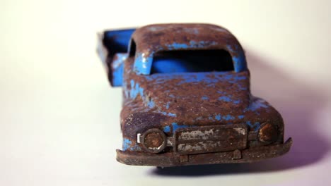 old and rusty vintage soviet era metal tinplate toy truck without wheels