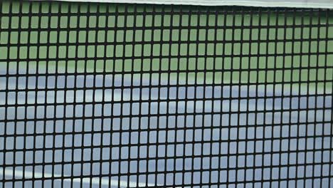 close-up of a professional tennis net designed for atp tournaments, made with durable rubber material