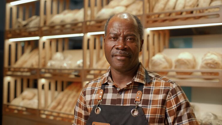 Man Working in a Bakery