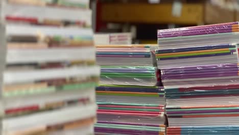 books at a book store for display. notebooks for school