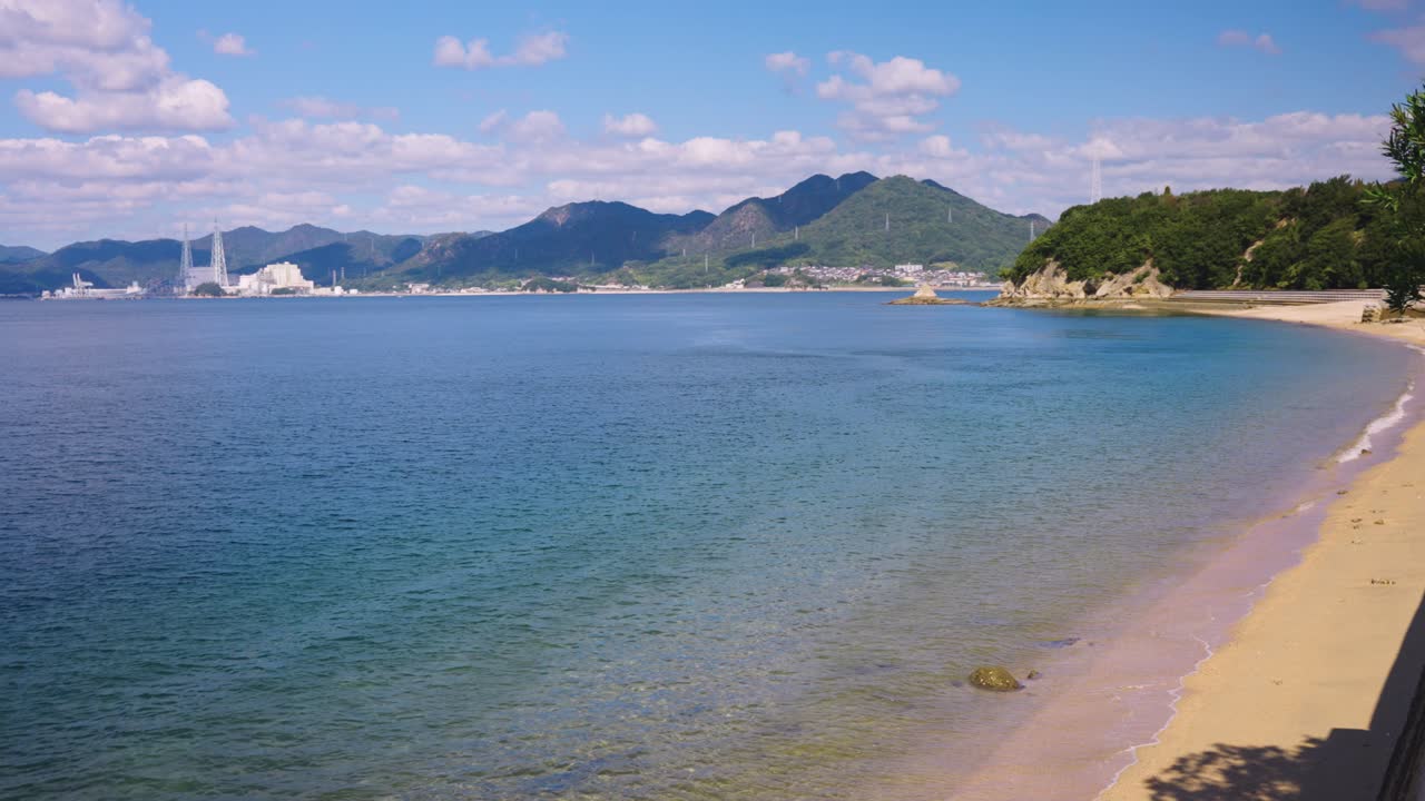 Serene Beach with Mountain View