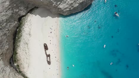 aerial top-down view of the navagio shipwreck beach in the mediterranean island of greece