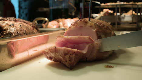 slicing ham into small pieces