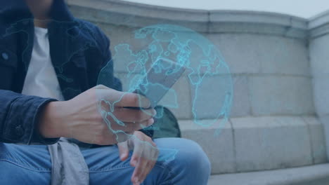 animation of digital globe over man using smartphone