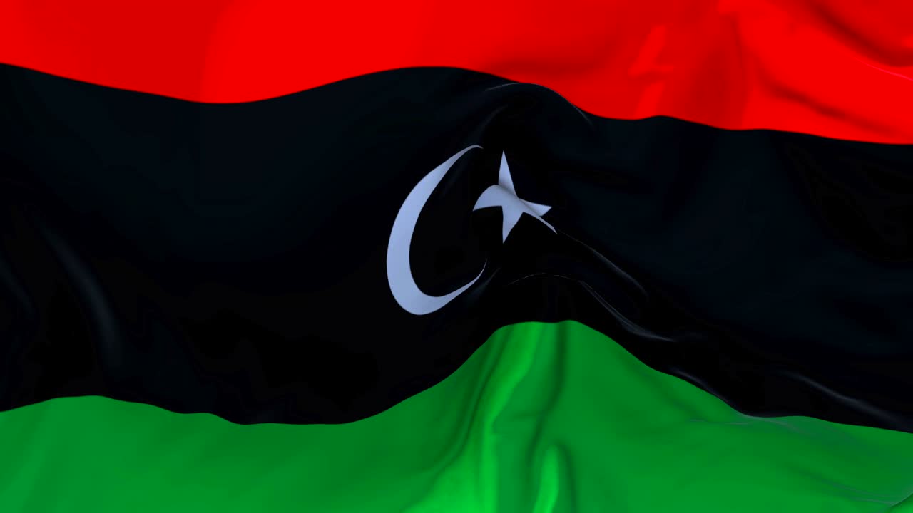 Libya Flag Waving in Wind Slow Motion Animation . 4K Realistic Fabric Texture Flag Smooth Blowing on a windy day Continuous Seamless Loop Background.