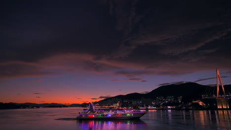 landscape of a sea under the sunset with a beautiful cruise moving