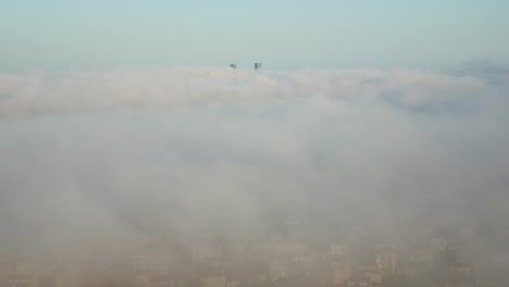 city covered in fog