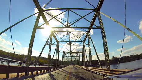 Point-of-view-shot-driving-across-New-Hope-Lambertville-Bridge,-heading-west-into-Pennsylvania