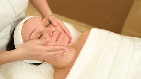 facial treatment with professional massage of cosmetician