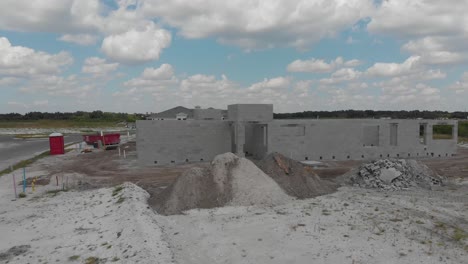 Florida-new-home-construction-on-sand,-cinder-block-knocked-out-at-the-base,-ready-for-rebar-and-cement-fill