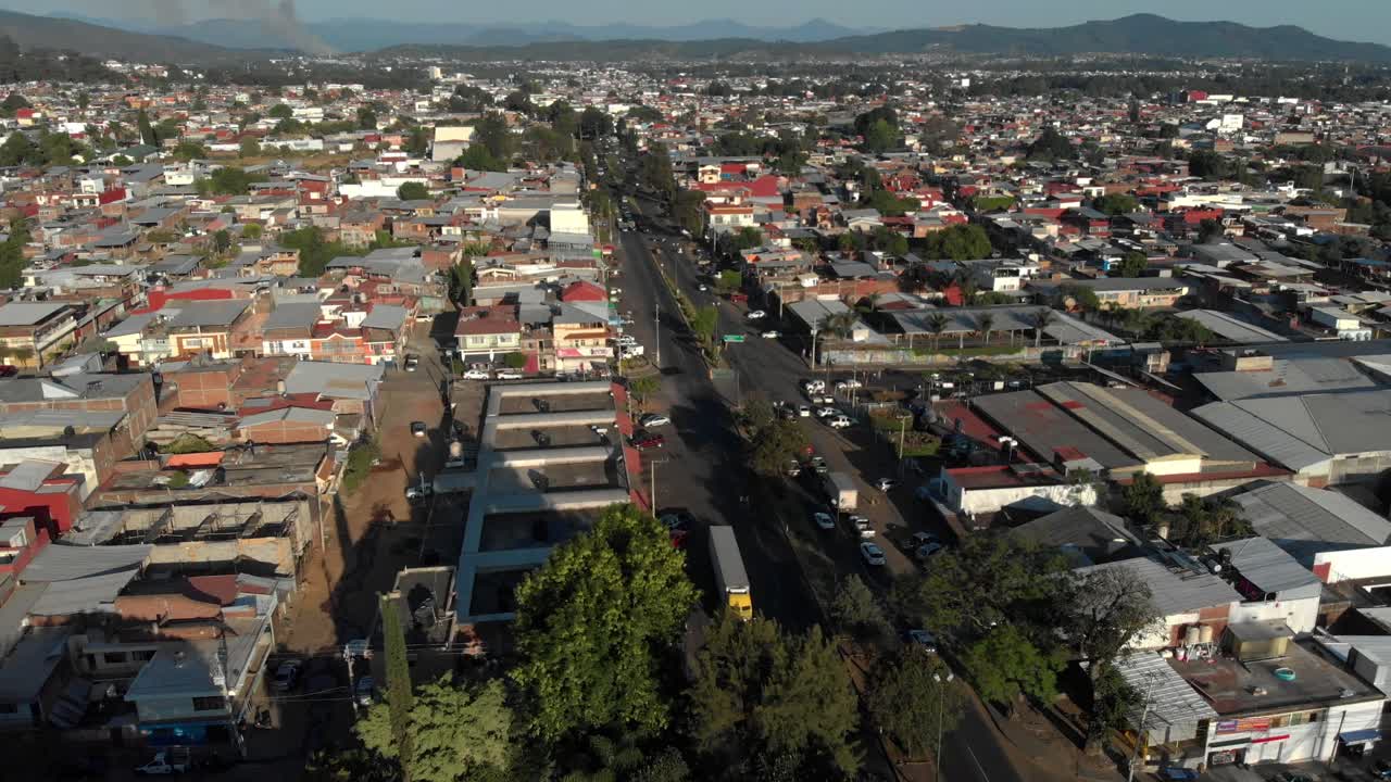 DRONE : DOLLY IN SHOT OF NORTHERN URUAPAN AT SUNSET