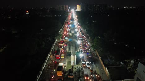 In-the-middle-of-the-city,-there-is-heavy-traffic-at-a-busy-hour-of-the-night-but-no-electricity