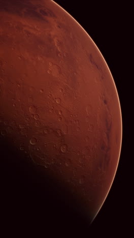 vista de cerca de marte, mostrando su superficie roja y cráteres