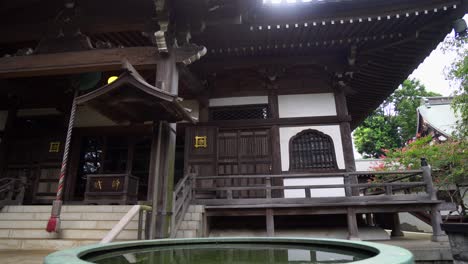 in many buddhist temples in japan there are various sculptures of different deities of that religion. here is a very particular sculpture and a beautiful architectural design of his building.