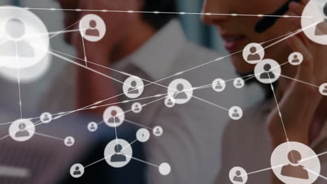 animation of network of connections and icons over business people wearing headsets