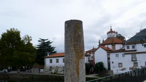 Inscribed-Pillar-by-Roman-Bridge,-Chaves,-Portugal