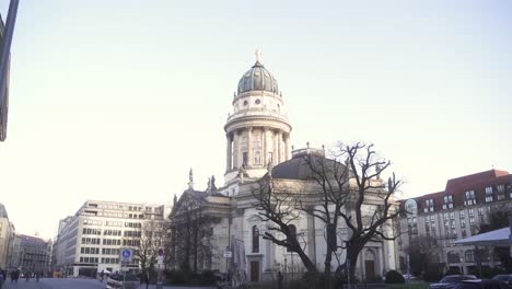 a video of the berlin church, which is located on the famous gendarmenmarkt square in berlin. the church is a major tourist attraction.
the church appears imposing, through the camera perspective.