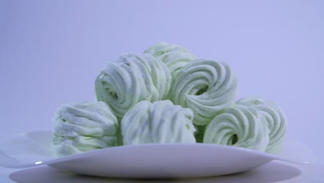 pile of green marshmallows on a plate