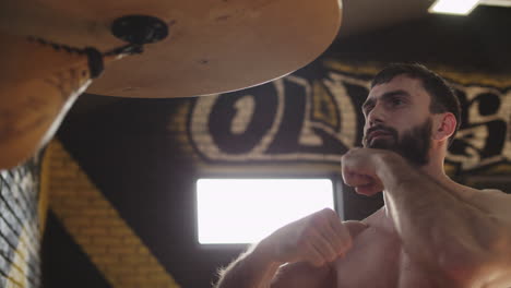 young boxer practicing punches