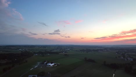 An-evening-aerial-flight-over-the-lush-farmland-of-Lancaster-County-into-the-sunset