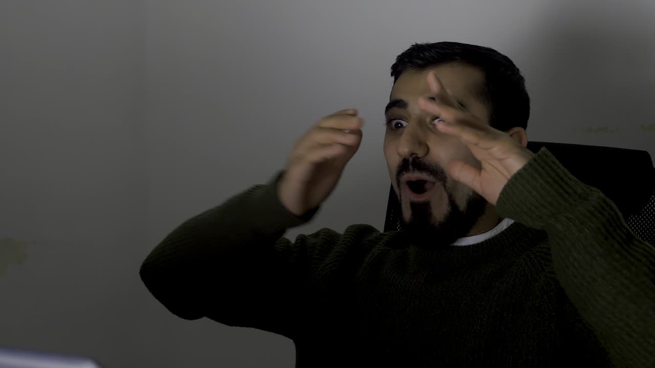 Man Looking at a Computer, Concerned