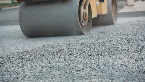 road roller working on a gravel