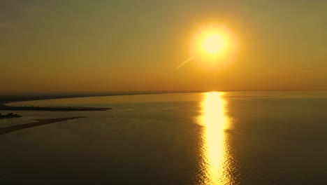 Aerial view over the delta of the Vistula to the Baltic Sea at sunse. Mikoszewo, Jantar