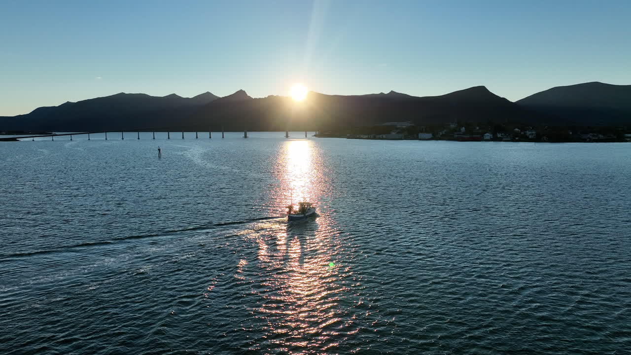Captured along the Norwegian coast, this cinematic story features a fishing boat approaching the harbor.