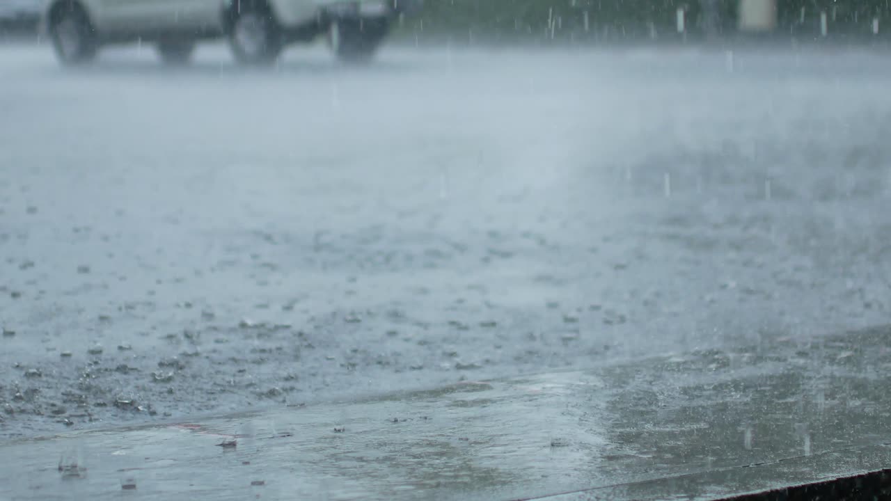 4k video POV to the local road in Phuket city while heavy raining in the rainy season