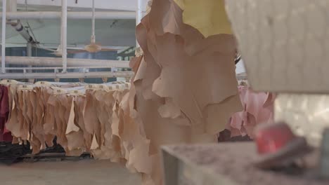 close up shot of flashing light on an automated drying rack in a leather factory