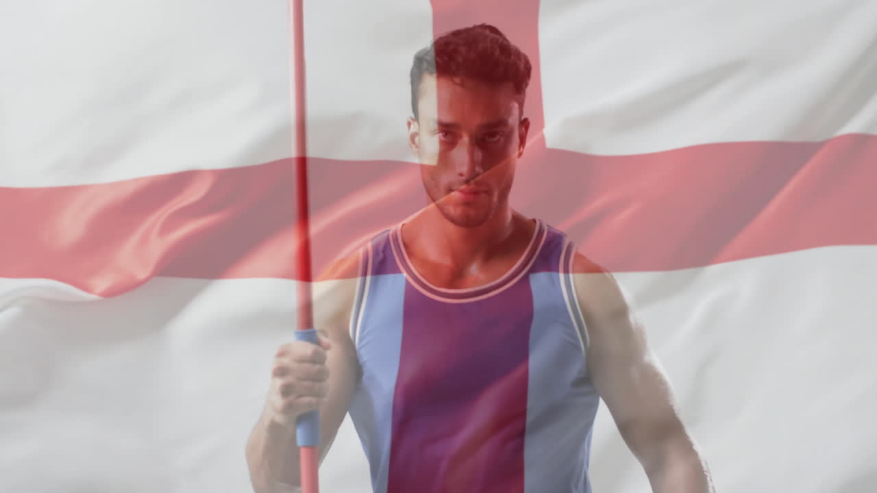 анимация флага англии над кавказским мужчиной, бросающим копье.