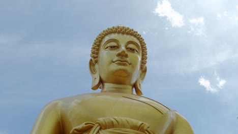 footage of the majestic big buddha golden statue inside wat paknam phasi charoen temple in bangkok, thailand. the video captures the intricate details of the statue and the sacred interior