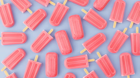 a vibrant pattern of pink popsicles on a blue background