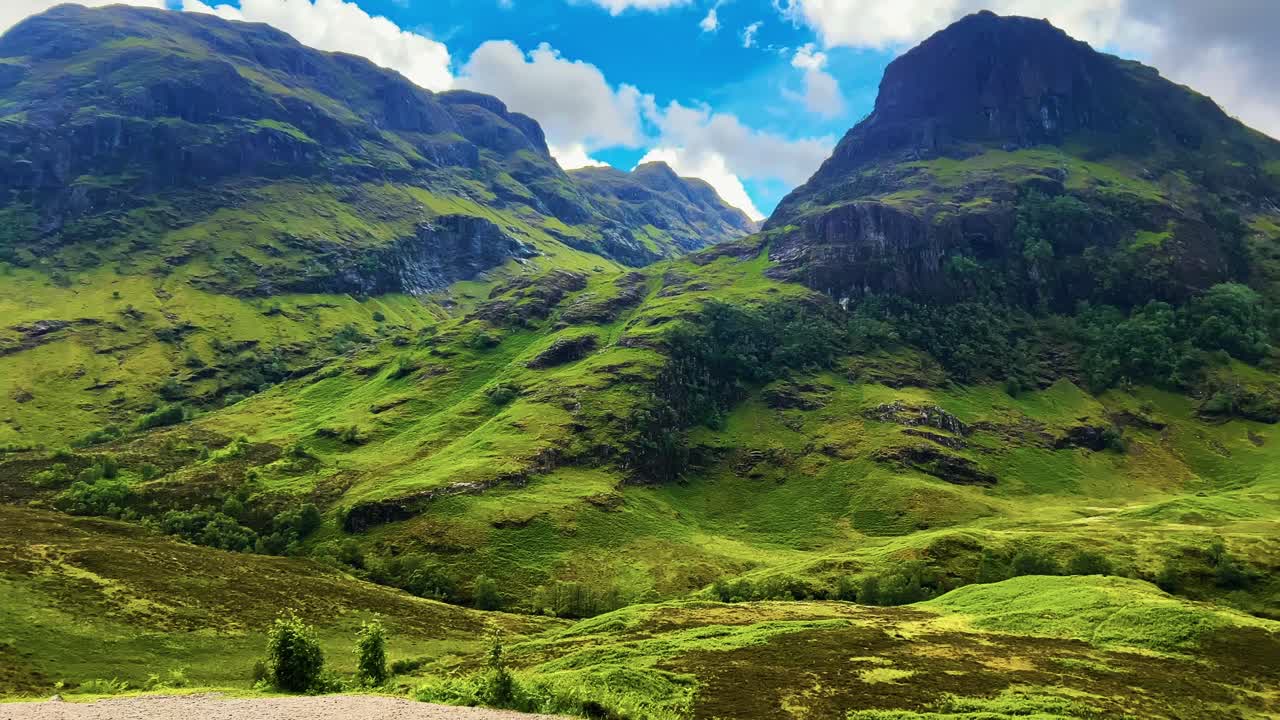 Dramatic Rocky Mountain Landscape Of Glen Coe In The Scottish Highlands. Panning Shot