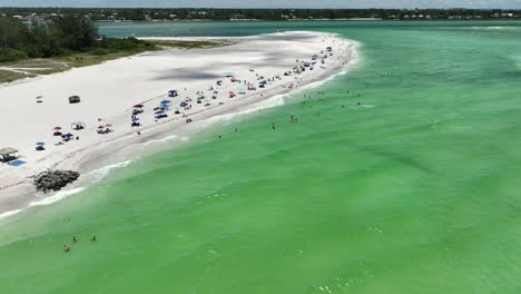 drone view of beachgoers in florida