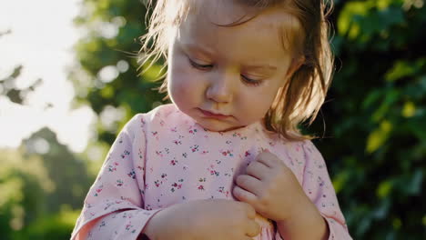 little girl with a hurt arm